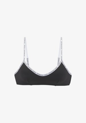 Juodas bikini viršus su plonomis petnešėlėmis ir baltu prekės ženklu. Lygus matinio audinio paviršius, trikampio forma ir minimalistinė dizaino estetikos.