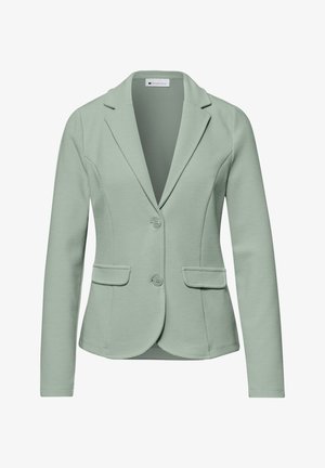 Blazer texturizado para mujer en verde claro con solapas con muesca, dos botones y bolsillos con solapa, mostrado sobre un fondo blanco.