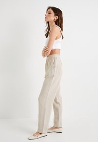 Koton Pantalon classique - beige