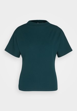 Teal short-sleeve top with a high neckline, made of smooth fabric. Features a fitted silhouette and minimal stitching details.