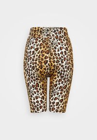 Leopardmönstrade cykelshorts i elastiskt material, med hög midja och en blandning av bruna, svarta och krämfärger över hela tyget.