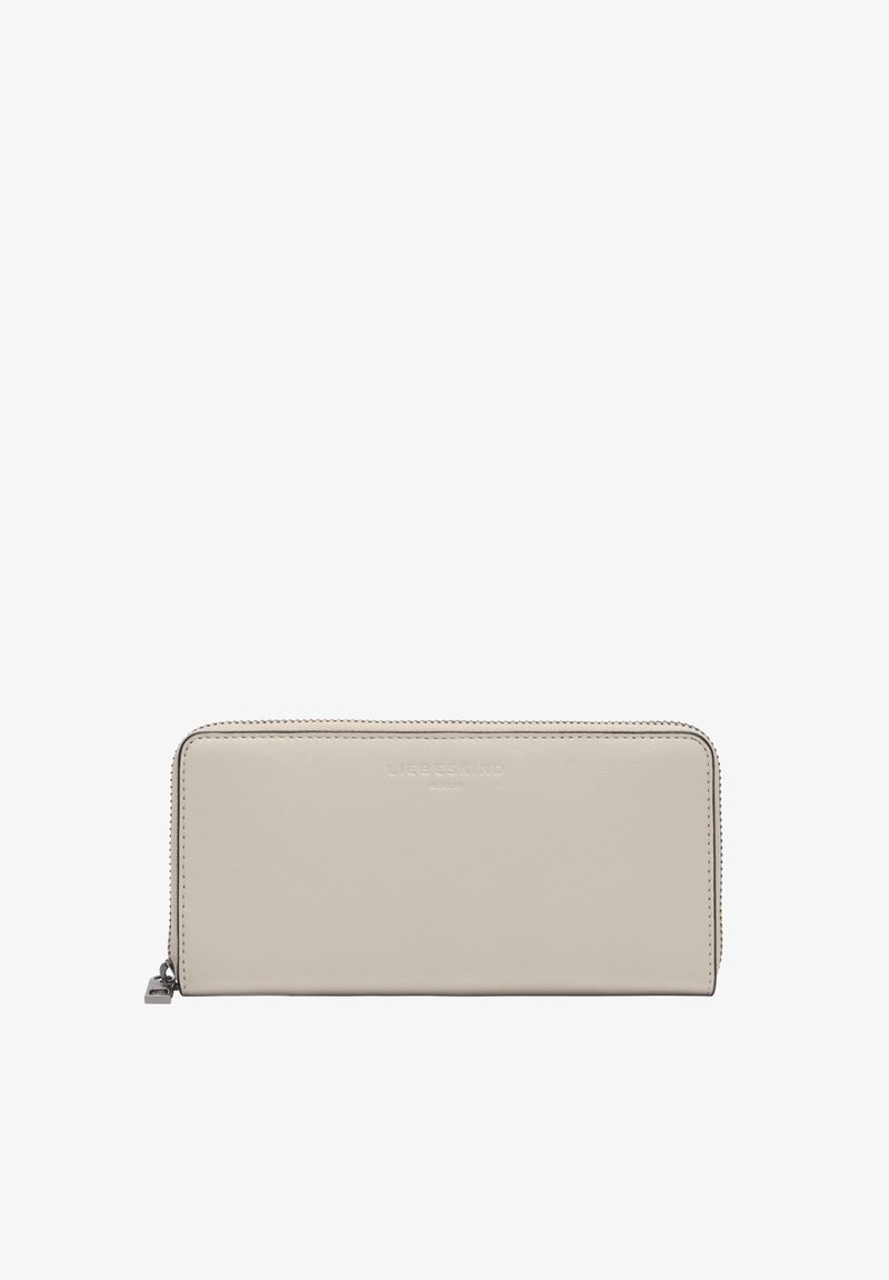 Portefeuille en cuir beige à fermeture éclair sur tout le tour, avec des coutures discrètes et un petit tire-zip argenté sur fond blanc.