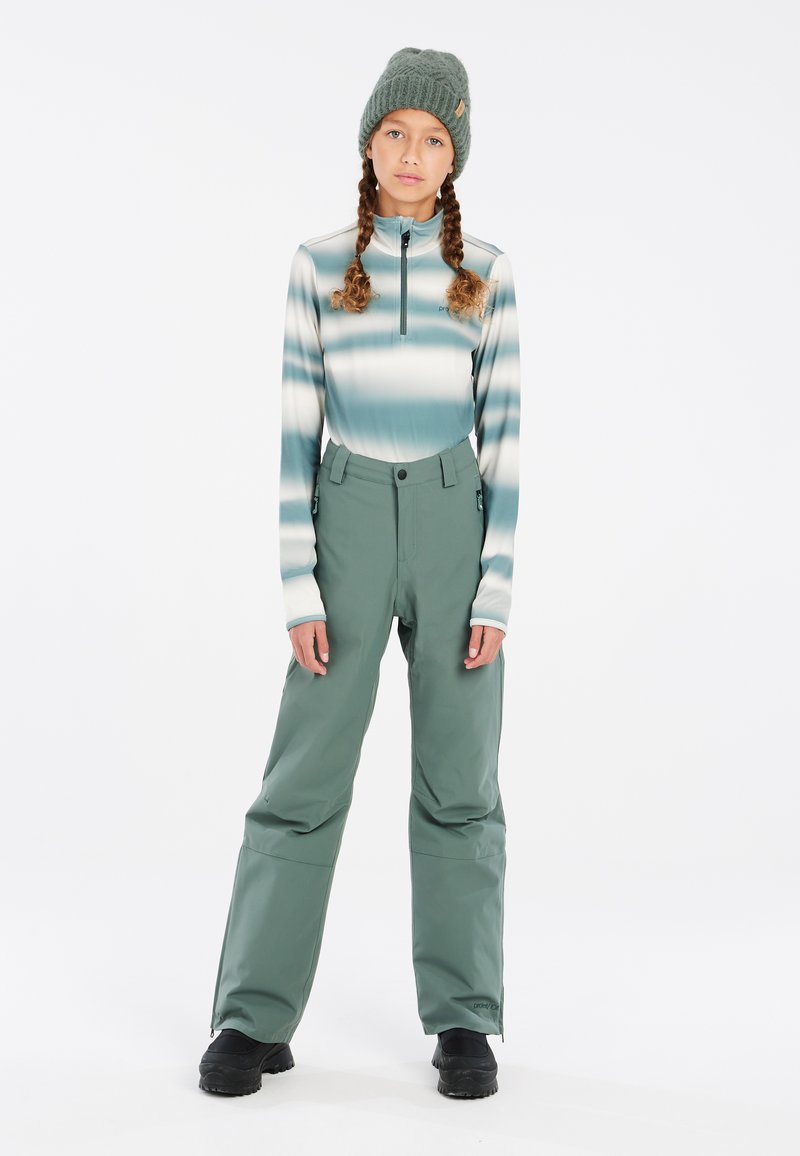 Langarmige, met rits sluitende top met een gradient turquoise en witte print. Losvallende, hoog-getailleerde groene broek met ritsen bij de enkels.