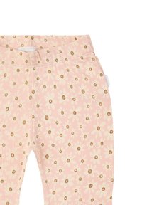 Leggings roses côtelés avec un motif floral comprenant des fleurs crème et des centres marron. La taille élastique garantit le confort.
