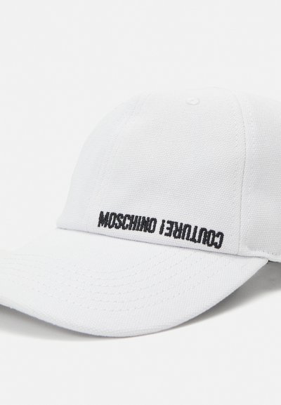 Șapcă de baseball din bumbac alb, cu vizieră curbată, brodată cu "Moschino Couture!" în negru pe partea din față. Prezintă detalii cusute.