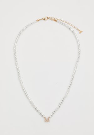 Pearl beaded necklace with gold adjustable clasp and small gold letter "M" pendant encrusted with tiny crystals.