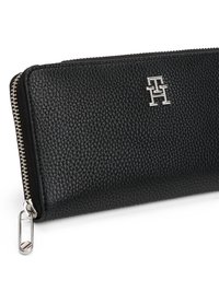 Black leather zippered wallet with a textured surface; features a silver logo and metal zipper pull with a keyring attachment.