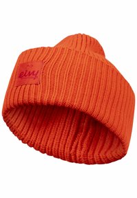 Orange knitted beanie with ribbed texture. Features a folded brim and a square fabric patch with logo on the side.