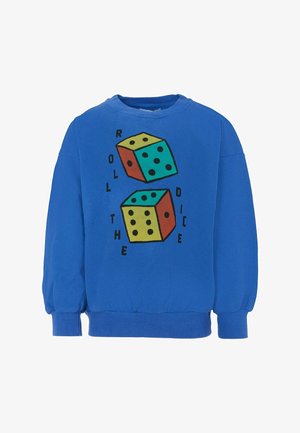 Felpa blu con una grafica di due dadi colorati e il testo "LANCIA I DADI." Il materiale sembra morbido e ha una vestibilità comoda.