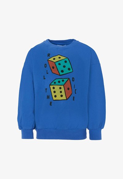 Felpa blu con una grafica di due dadi colorati e il testo "LANCIA I DADI." Il materiale sembra morbido e ha una vestibilità comoda.