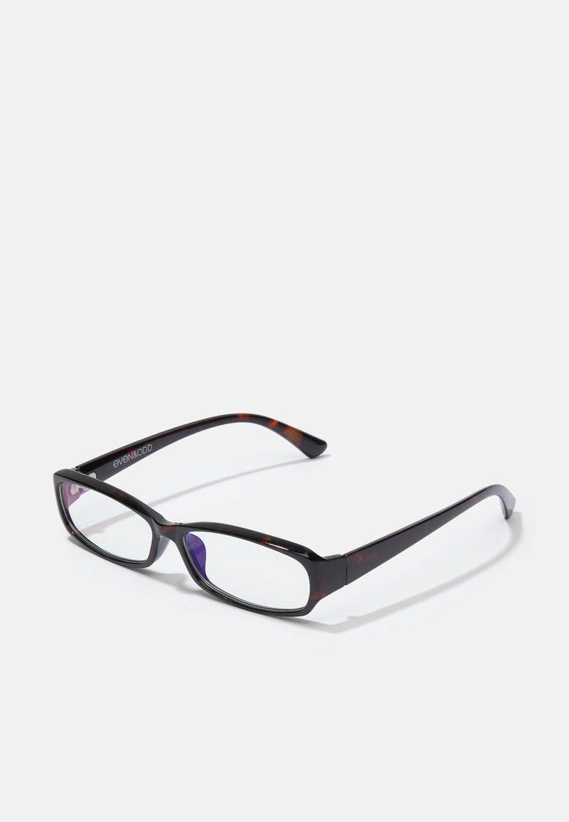 Ochelari dreptunghiulari din tortoiseshell maro cu lentile clare. Brațe subțiri, netede și o ușoară curbă la tâmple. Numele mărcii pe braț.