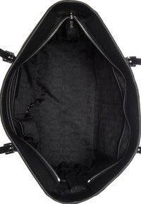 Sac à main en cuir noir avec un extérieur lisse, fermeture éclair et intérieur en tissu présentant un motif subtil de cercles. Plusieurs poches intérieures incluses.