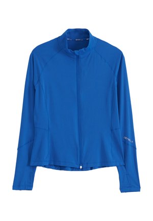 Chaqueta deportiva azul de manga larga con cremallera frontal, cuello alto, orificios para los pulgares en las mangas y un logo sutil en el brazo izquierdo.