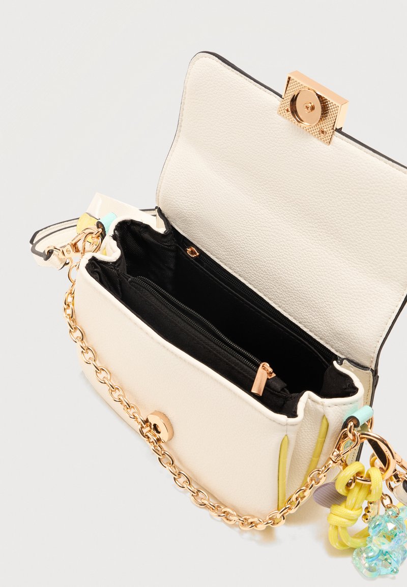ALDO Multicolor Chevron Crossbody with White Base and Gold Chain Aldo White Chevron Quilted Crossbody Bag With Gold Chain  main image 2