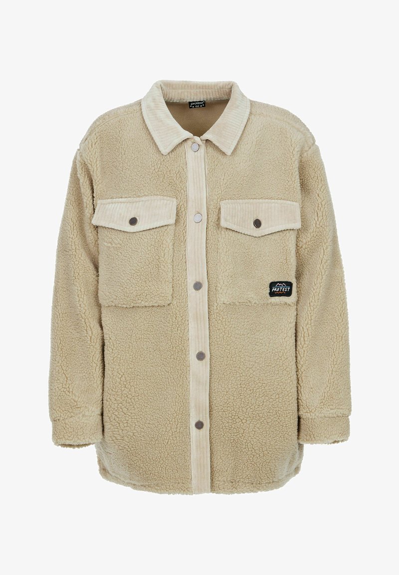 Giacca in felpa beige con colletto in velluto a coste, due tasche sul petto e bottoni a pressione sulla parte frontale. Texture morbida e vestibilità rilassata.