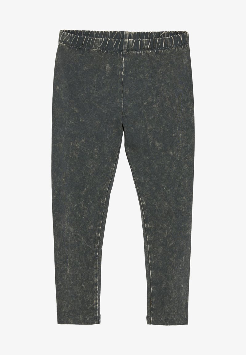 Leggings en denim noir avec une apparence décolorée, dotés d'une taille élastique et d'une coupe slim. La texture présente des variations subtiles.
