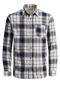 Geruite overhemd met lange mouwen in wit, marineblauw en roestkleur. Gemaakt van zachte stof. Voorzien van een button-down kraag en een borstzak.