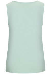 Majica bez rukava u mint zelenoj boji, izrađena od mekog materijala s glatkom teksturom, sa okruglim izrezom i jednostavnim dizajnom.
