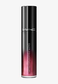 Svart topp på en rörformad MAC Dazzleshadow Liquid ögonsmink med glittrande rosa flytande ögonskugga inuti.