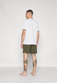 Puma STUDIO FOUNDATION SHORT - Αθλητικό σορτς - dark olive