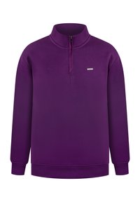 Pólder morado de manga larga con cuello alto y cremallera corta en la parte delantera, puños y dobladillo acanalados, y un pequeño logotipo rectangular en el pecho.