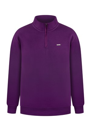 Fioletowy długi rękaw sweter z wysokim kołnierzem i krótkim zamkiem z przodu, ściągacze na mankietach i dolnej krawędzi oraz małe prostokątne logo na klatce piersiowej.