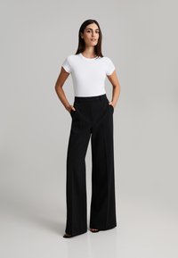 ANDIATA GISELLA - Nohavice - black