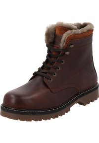 Bruine leren laars met een zachte bontvoering bij de kraag, duurzame rubberen zool en donkerbruine veters. Voorzien van versterkte stiksels en een logo.
