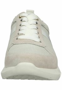 Sneakers featuring a blend of light gray suede and mesh, with white laces and a flexible rubber sole. Rounded toe and subtle texture.
