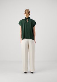 DRYKORN ALARIA - Bluse - dark green