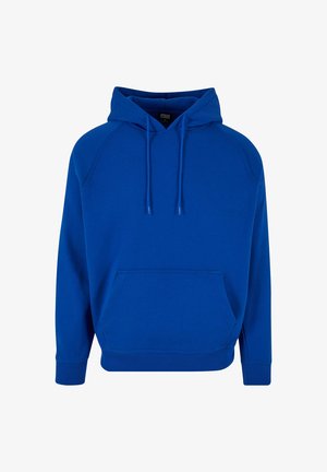 Niebieska bawełniana bluza z kapturem z kieszenią z przodu, sznurkiem do ściągania i ściągaczami przy mankietach. Charakteryzuje się luźnym krojem oraz rękawami raglanowymi dla większej swobody ruchów.