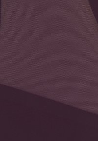 Textured fabric featuring a rich purple hue, with a smooth section and a geometric pattern of small dots.
