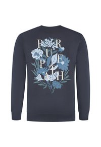 Marineblauwe sweatshirt met lange mouwen, versierd met een bloemmotief in lichtblauw en crème, met de tekst "PURPA" over de bloemen heen.