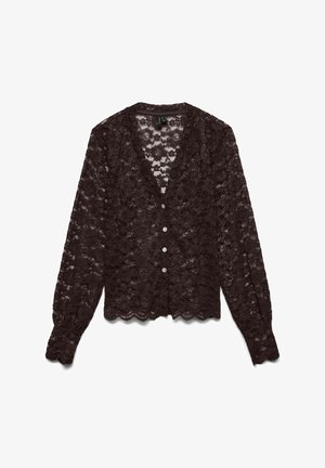 Čipkasti kardigan tamno smeđe boje s V-izrezom i zatvaračem na kopčanje. Ima duge rukave i rub s valovitim obodom. Detaljan cvjetni uzorak po cijeloj površini.