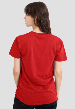 Red cotton t-shirt with short sleeves, a crew neckline, and a casual fit. The fabric appears smooth with minimal seams.
