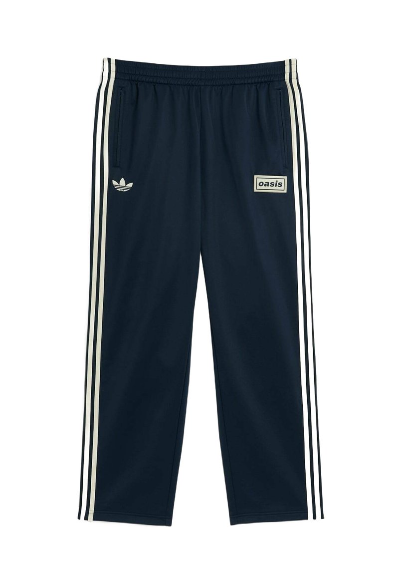 Navy track pants in a lightweight fabric, featuring three white stripes along the sides and a small "oasis" logo on the front.