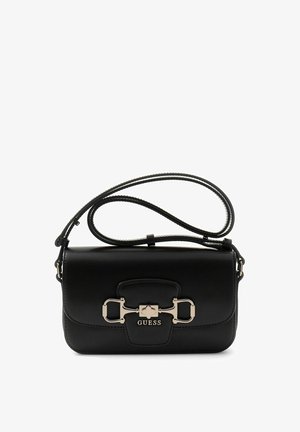 Black Guess shoulder bag with gold-tone hardware and adjustable strap, featuring a front clasp and logo detailing.