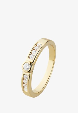 Goldener Ring mit einem zentralen runden Diamanten und sechs kleineren Diamanten, die in zwei Reihen entlang des Rings gesetzt sind.