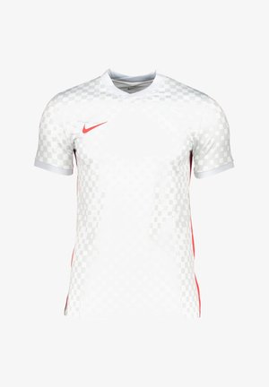 Maillot de football blanc à manches courtes avec un motif à carreaux et des accents rouges. Il possède un col rond et le logo Nike en rouge sur la poitrine.