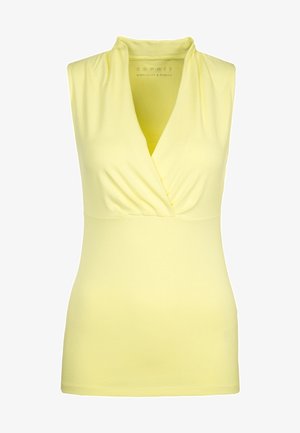 Žlutý bezramínkový top s výstřihem do V, nařaseným materiálem v oblasti dekoltu a přiléhavým střihem. Vyrobeno z měkkého, elastického materiálu.