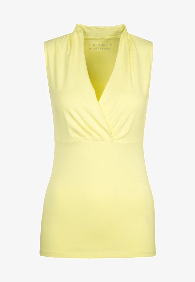 Haut sans manches jaune avec un décolleté en V, tissu froncé au niveau de la poitrine et une silhouette ajustée. Fabriqué en tissu doux et extensible.