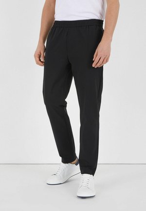 Pantalones deportivos - black