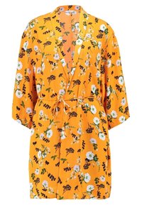 Floral kimono in bright orange fabric. Features a belted waist, wide sleeves, and a mix of white, purple, and black floral patterns.
