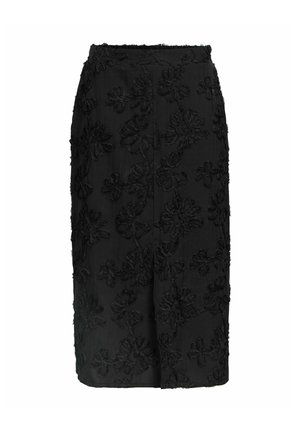 Jupe noire longueur genou avec des motifs d'appliqué floral texturés et une taille ajustée.