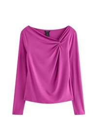 Långärmad topp i ljusrosa. Har en bred halsringning med en vridningsdetalj framtill. Tillverkad av ett mjukt, stretchigt tyg.