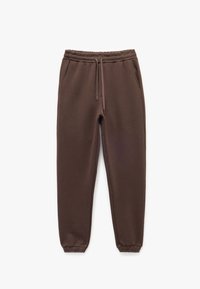 Brune sweatpants lavet af blødt stof, med elastisk talje med snor, sidelommer og ribbede ankelmanchetter.