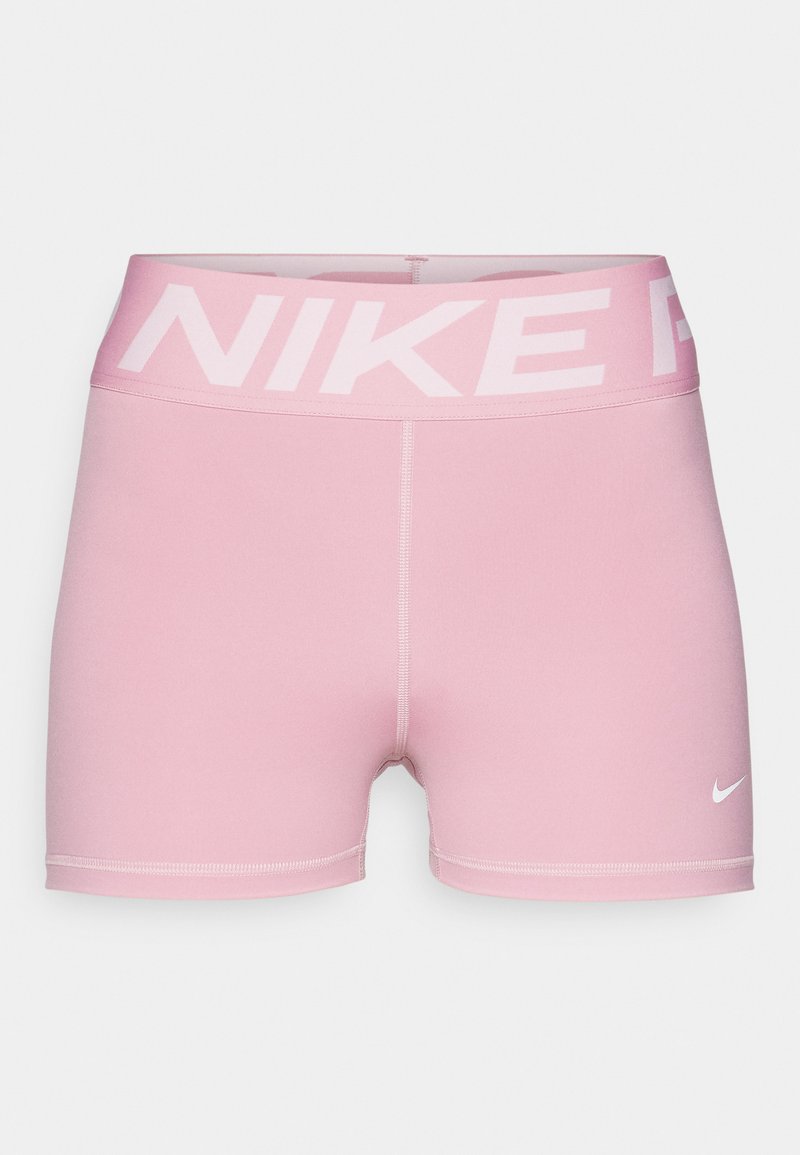 Shorts Nike roses avec une ceinture large à logo, fabriqués à partir d'un tissu lisse. Présentent un design ajusté et un swoosh Nike blanc contrastant.