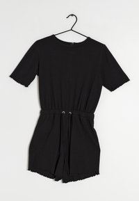 Black short-sleeve romper featuring a drawstring waist, frayed edges, and a round neckline. Made from soft, lightweight fabric.