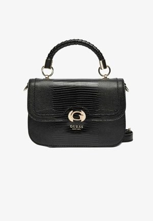 Sac à main noir en cuir synthétique effet crocodile avec poignée supérieure, fermoir doré en forme de "G" et logo Guess embossé sous le rabat.