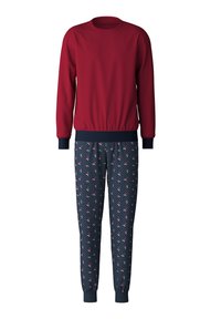 Felpa rossa a maniche lunghe con polsini a costine e cintura blu navy, abbinata a pantaloni sportivi blu navy con un motivo che presenta dettagli rosa e pois bianchi.